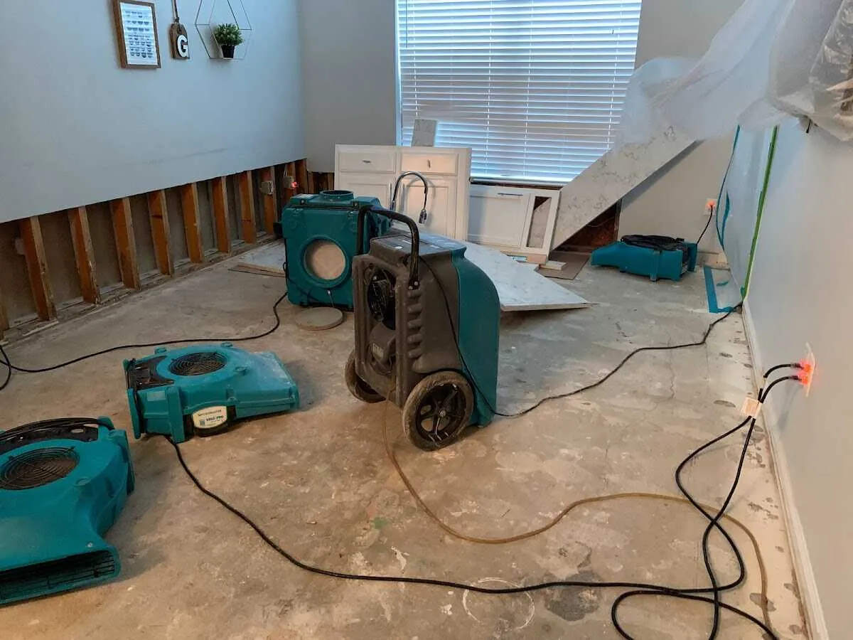 Dehumidifier in flood-cut room for Water Damage Restoration in Kenwood